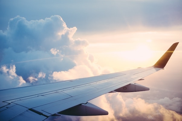 airplane wing over the clouds