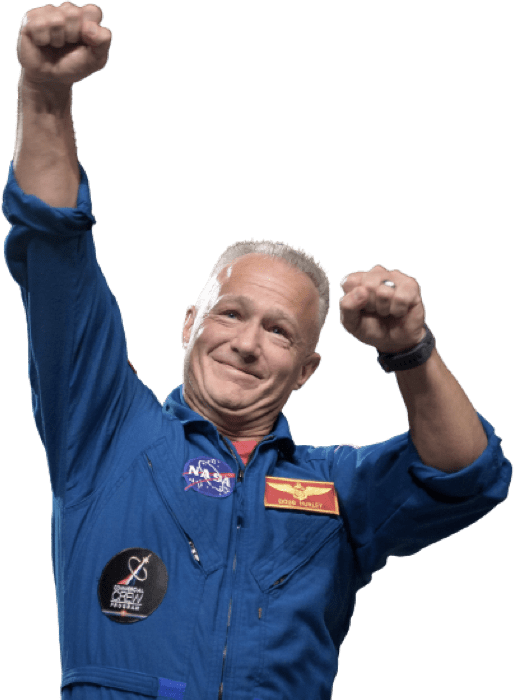 Douglas Hurley in a blue NASA jumpsuit